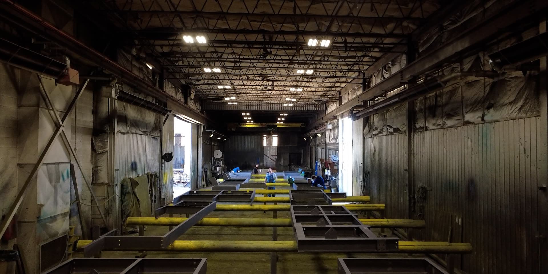 Coating facility, frames staged for finishing