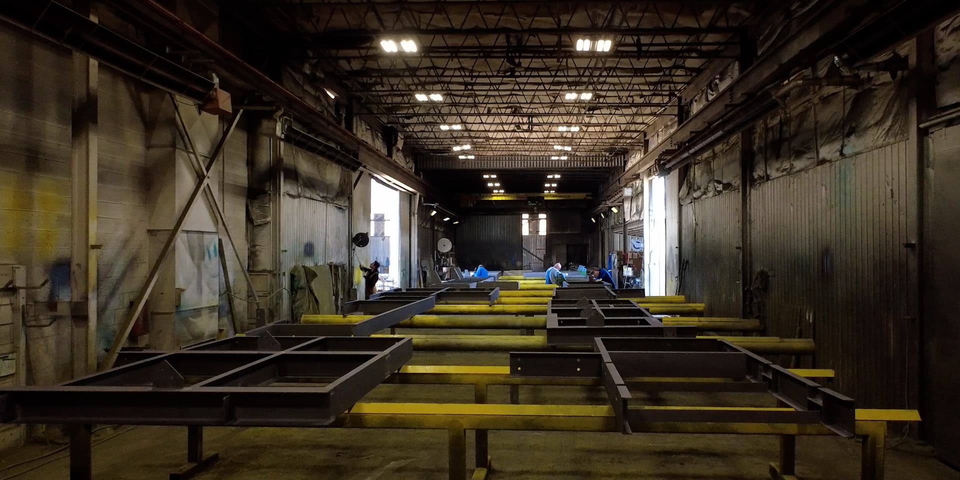 Fabrication shop interior, crane bay length view