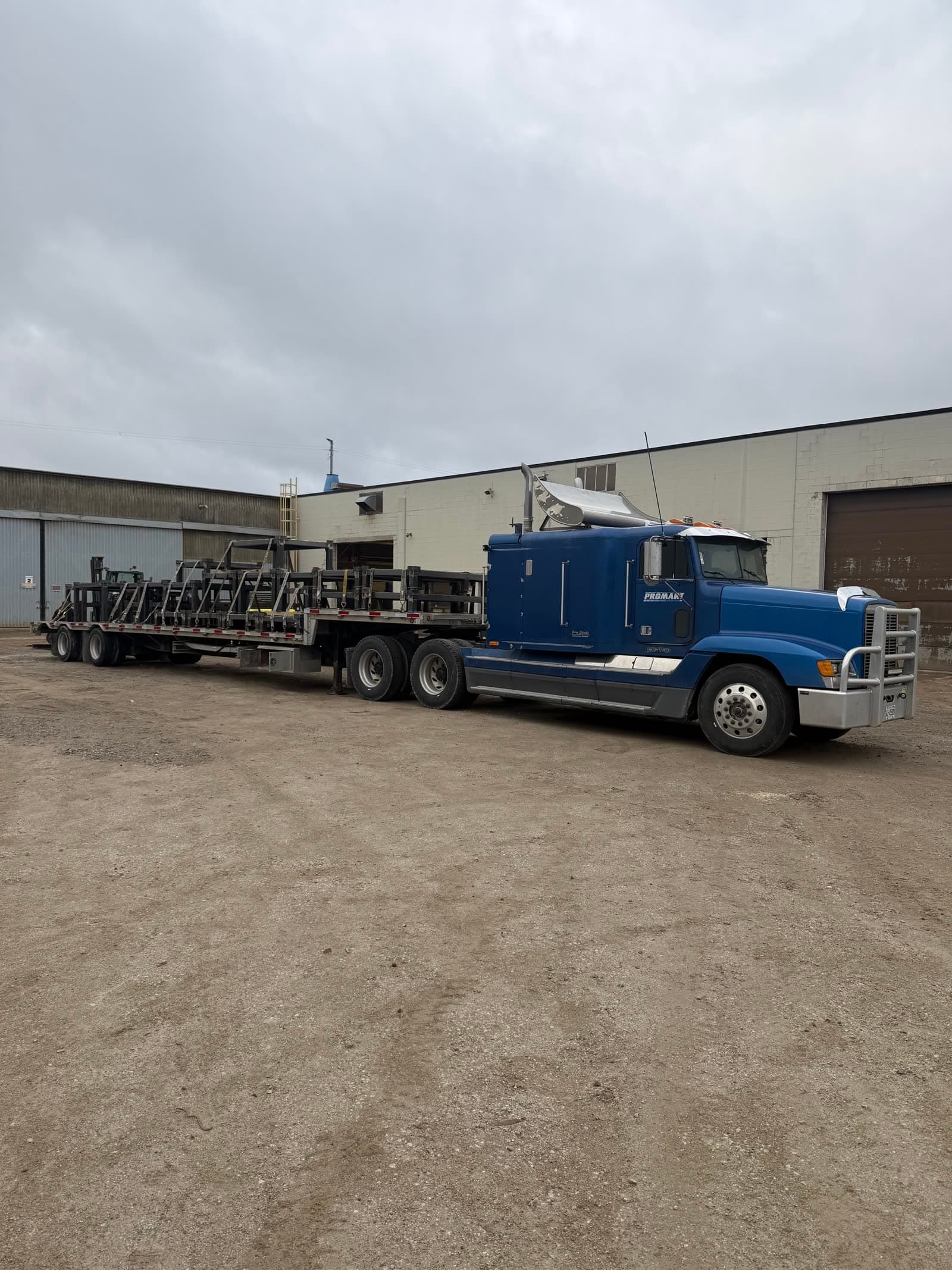 Promart tractor-trailer loaded at the shop